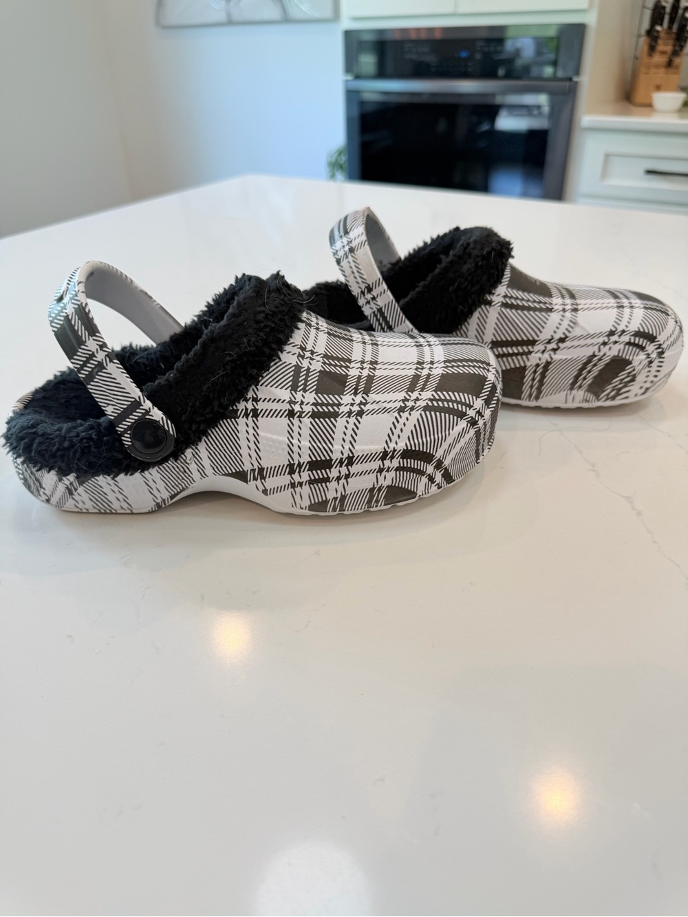 Off brand Women’s crocks, plush inside worn couple times, says size 5/6 fits 8